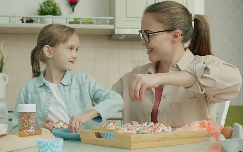 Woman and girl talking