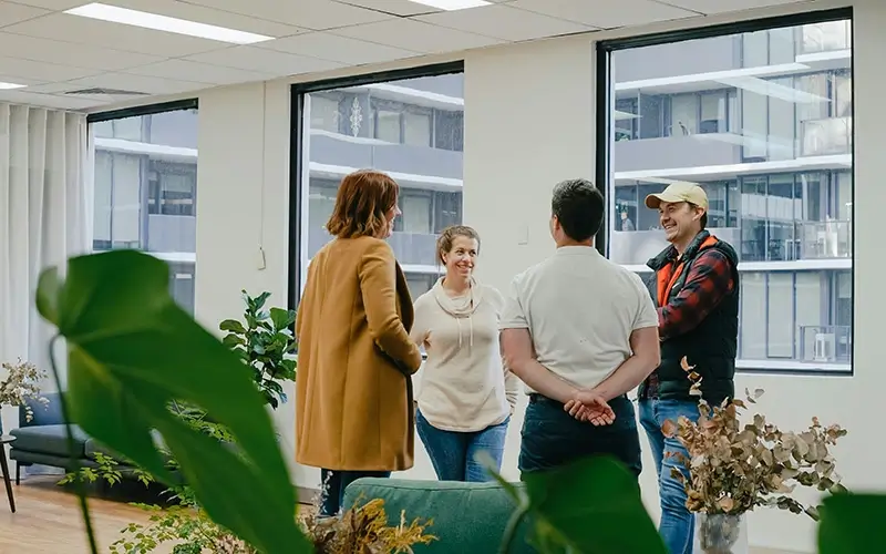 People standing together talking